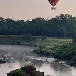 hot air balloons over mountain scaled
